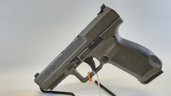 like new canik tp9sf 9mm 18rds w/original case, extra mag