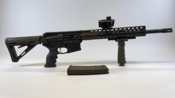 used anderson mfg. am-15 223wylde w/optic sight & vertical grip